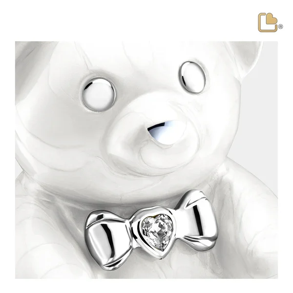 Teddy bear shaped child urn closeup face and crystal detail