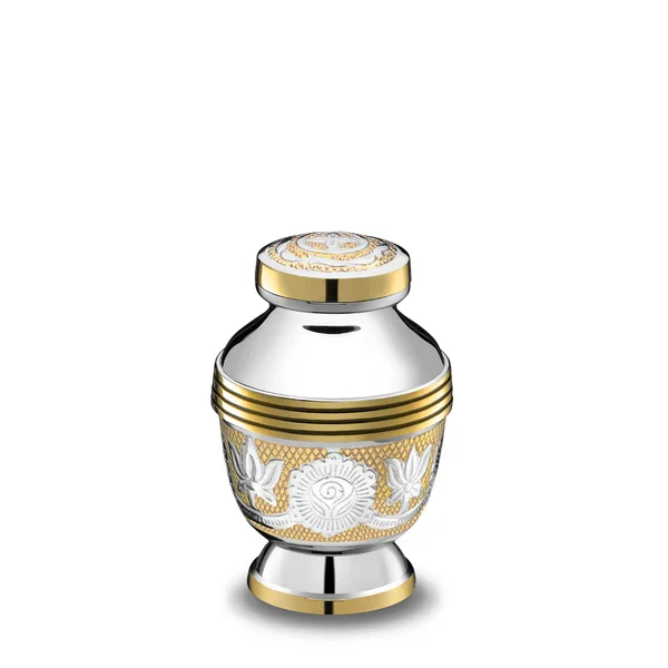 Brass Keepsake sized urn features intricate jali work